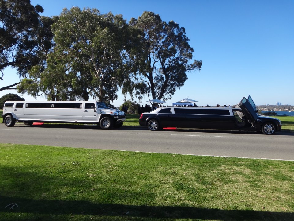 Two Limousine Royalty limos parked for a wine tour of Perth.